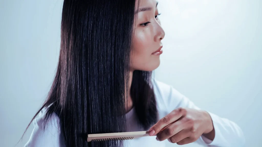 Combing Her Hair